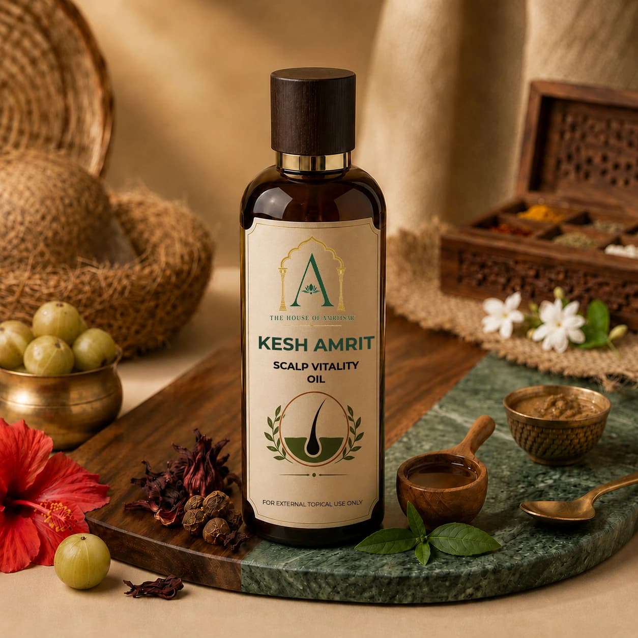 Kesh Amrit Scalp Vitality Oil by The House of Amritsar, in amber glass with its signature botanicals.
